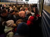 Refugees struggle to board a train at Lviv's main station, Ukraine. Picture: Gustavo Basso/NurPhoto via Getty Images