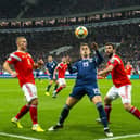 Lawrence Shankland shields the ball from Georgi Dzhikiya during the UEFA European Qualifier against Russia at the Luzhniki Stadium, on October 10, 2019, in Moscow. Scotland lost 4-0 (Photo by Alan Harvey / SNS Group)