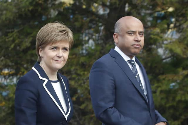 First Minister Nicola Sturgeon with Sanjeev Gupta, the head of the Liberty Group, ahead of a ceremony where Tata Steel handed over the keys of two Lanarkshire steel plants to metals firm Liberty House, at Dalzell steelworks in Scotland. Picture: PA