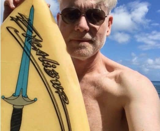 Author Andy Martin with one of Ted Deerhurst's Excalibur surfboards