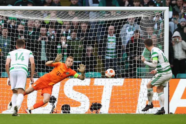 Callum McGregor has his penalty saved by Denes Dibusz.