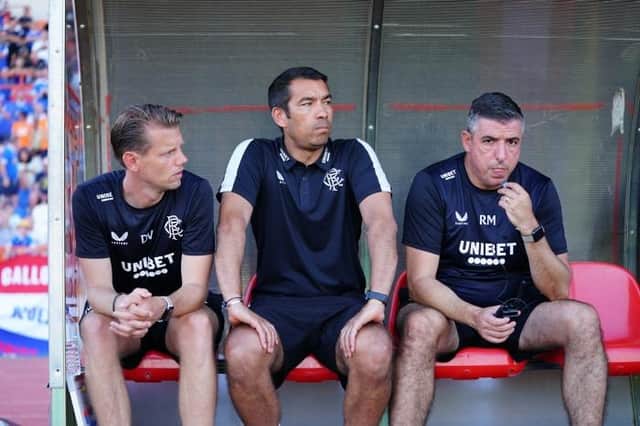 Rangers management team Giovanni van Bronckhorst, Dave Vos and Roy Makaay have a Champions league qualifier to prepare for (Photo by Gualter Fatia / SNS Group)