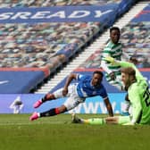 Jermain Defoe finishes off a fine individual goal to complete the scoring in Rangers' 4-1 win over Celtic at Ibrox on May 2. (Photo by Ian MacNicol/Getty Images)