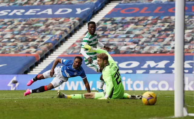 Jermain Defoe finishes off a fine individual goal to complete the scoring in Rangers' 4-1 win over Celtic at Ibrox on May 2. (Photo by Ian MacNicol/Getty Images)