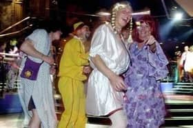 Stag-party revellers dance at the Revolution on Lothian Road, June 29, 2001. Is that Ali G dancing with Agnetha and Frida from ABBA? Revolution is no longer a nightclub and has since been transformed into Wetherspoon gastro pub Caley Picture House.