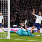 England’s Harry Maguire scores an own goal in the win over Scotland at Hampden Park.
