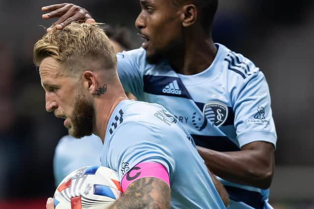 Sporting Kansas City's Johnny Russell, front, and Khiry Shelton celebrate Russell's goal against Vancouver Whitecaps on October 17. Photo by Canadian Press/Shutterstock (12542726i)