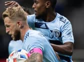 Sporting Kansas City's Johnny Russell, front, and Khiry Shelton celebrate Russell's goal against Vancouver Whitecaps on October 17. Photo by Canadian Press/Shutterstock (12542726i)