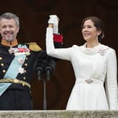 Denmark's King Frederik X and Denmark's Queen Mary wave from the balcony of Christiansborg Palace in Copenhagen, Denmark. Picture: AP Photo/Martin Meissner