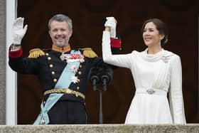 Denmark's King Frederik X and Denmark's Queen Mary wave from the balcony of Christiansborg Palace in Copenhagen, Denmark. Picture: AP Photo/Martin Meissner