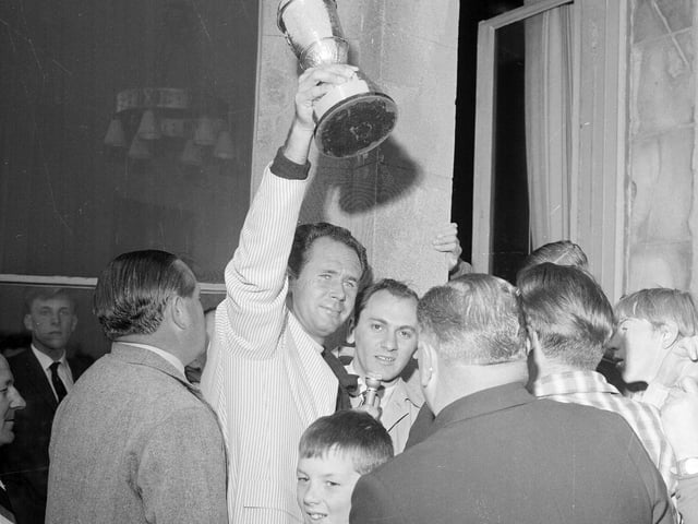 Tony Lema being presented with the Open Golf Trophy at St Andrews in 1964.