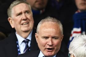 Rangers chairman John Bennett has adopted a more considered approach than predecessor Douglas Park (pictured behind) with notable results. (Photo by Rob Casey / SNS Group)