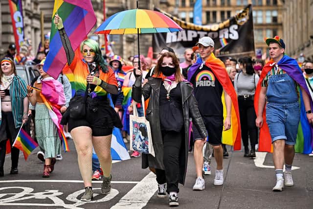 Members of the public attend Mardi Gla in Glasgow. (Photo by Jeff J Mitchell/Getty Images)