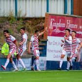 Hamilton's Shaun Want celebrates with the fans after scoring a last minute equaliser to make it 4-4 against Raith Rovers.