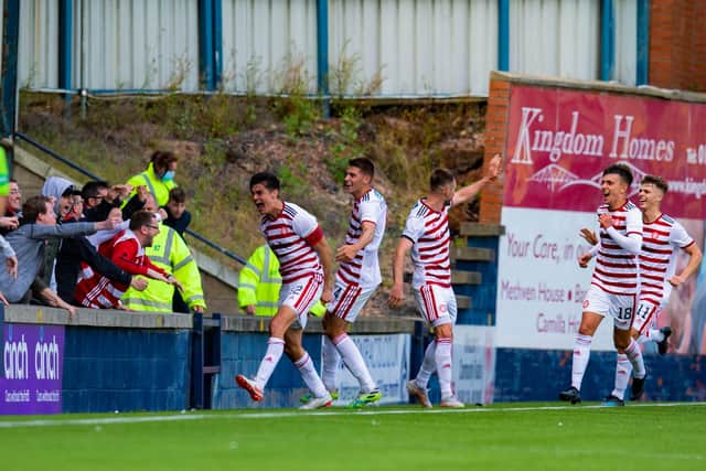 Hamilton's Shaun Want celebrates with the fans after scoring a last minute equaliser to make it 4-4 against Raith Rovers.