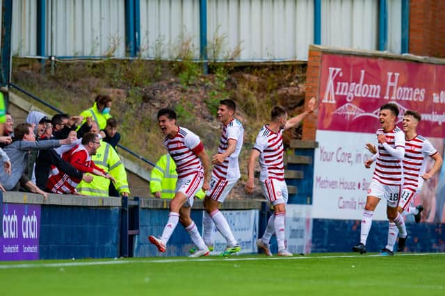 Hamilton's Shaun Want celebrates with the fans after scoring a last minute equaliser to make it 4-4 against Raith Rovers.