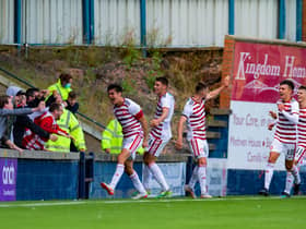 Hamilton's Shaun Want celebrates with the fans after scoring a last minute equaliser to make it 4-4 against Raith Rovers.