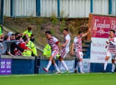 Hamilton's Shaun Want celebrates with the fans after scoring a last minute equaliser to make it 4-4 against Raith Rovers.