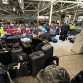 Suitcases are seen uncollected at Heathrow's Terminal Three baggage reclaim area (Picture: Paul Ellis/AFP via Getty Images)