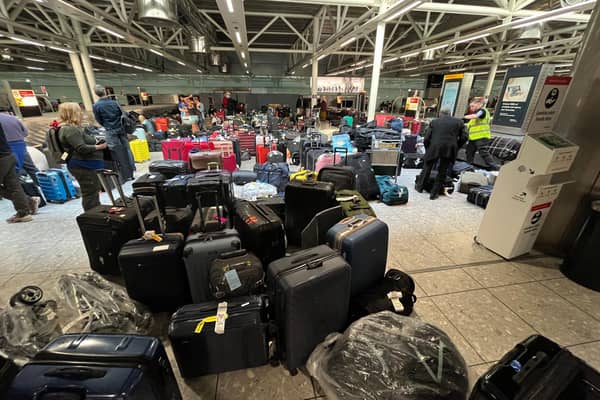 Suitcases are seen uncollected at Heathrow's Terminal Three baggage reclaim area (Picture: Paul Ellis/AFP via Getty Images)