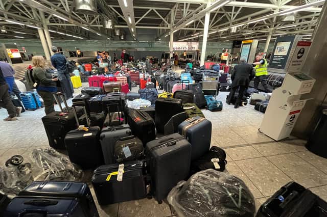 Suitcases are seen uncollected at Heathrow's Terminal Three baggage reclaim area (Picture: Paul Ellis/AFP via Getty Images)