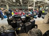 Suitcases are seen uncollected at Heathrow's Terminal Three baggage reclaim area (Picture: Paul Ellis/AFP via Getty Images)