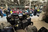 Suitcases are seen uncollected at Heathrow's Terminal Three baggage reclaim area (Picture: Paul Ellis/AFP via Getty Images)