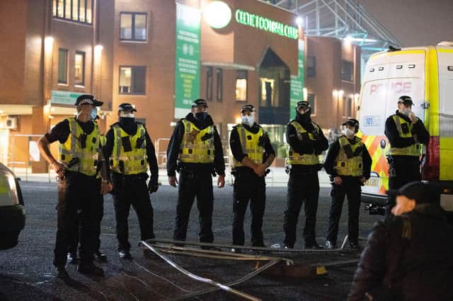 A large police presence as Celtic fans gather outside Celtic Park after a Betfred Cup defeat to Ross County on November 29, 2020, in Glasgow, Scotland. (Photo by Alan Harvey / SNS Group)