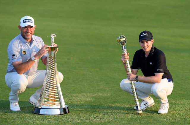 Lee Westwood with the Harry Vardon Trophy and Matt Fitzpatrick with the Dubai Tour Championship trophy after the final round of the DP World Tour Championship at Jumeirah Golf Estates last month. Picture: Ross Kinnaird/Getty Images.