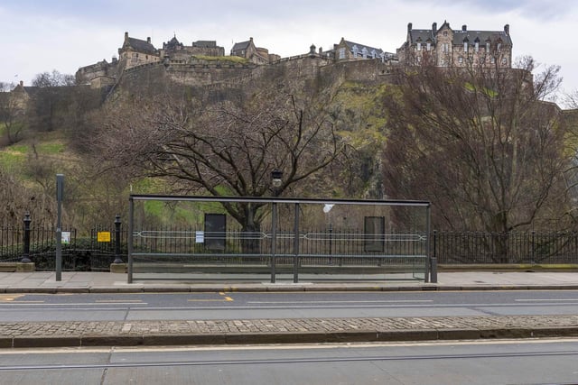 A bus stop on Princes Street is empty amid the ongoing coronavirus pandemic. (Photo by Mark Scates / SNS Group)