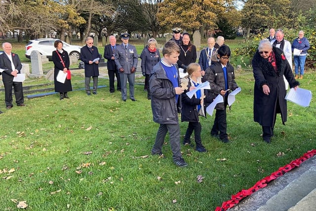 Pupils from Marine Park Primary School laid crosses during the service.