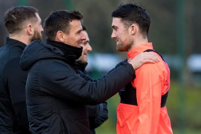Hearts assistant manager Lee McCulloch shares a light-hearted moment with Rangers-bound defender John Souttar during a training session at Oriam on Monday. (Photo by Ross Parker / SNS Group)
