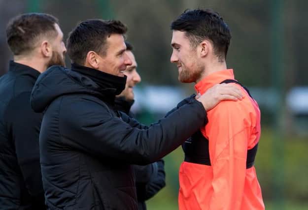 Hearts assistant manager Lee McCulloch shares a light-hearted moment with Rangers-bound defender John Souttar during a training session at Oriam on Monday. (Photo by Ross Parker / SNS Group)