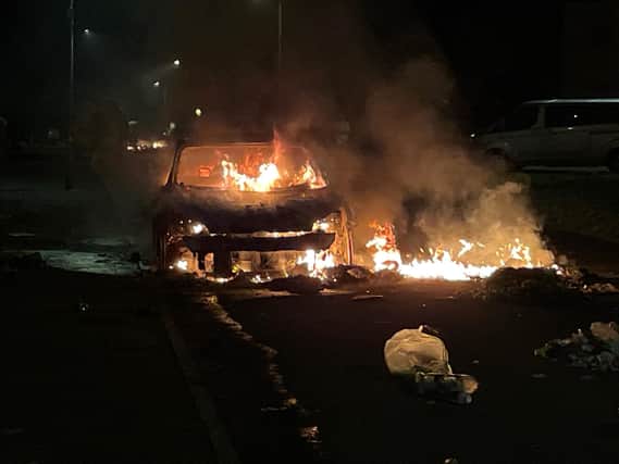 A Ford Focus car set alight on Highmead Road, Ely, Cardiff (Photo: Bronwen Weatherby/PA Wire)