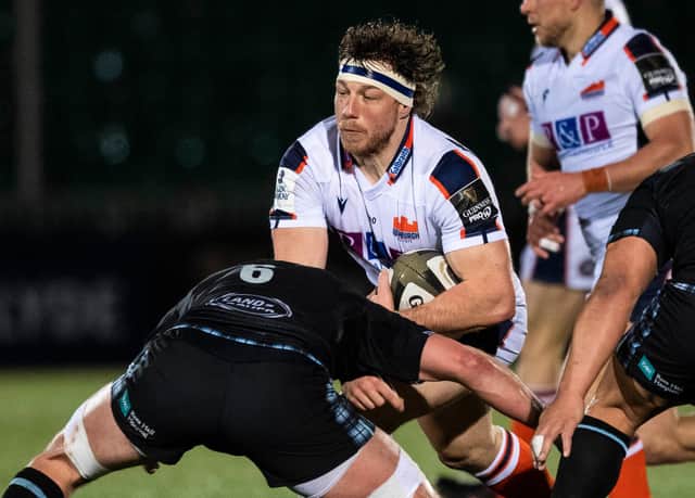 Action from a Glasgow v Edinburgh match as Hamish Watson takes on Ryan Wilson. Both sides will play in the United Rugby Championship next season.