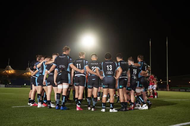 The Glasgow Warriors players huddle at full time after the 12-7 defeat by Newcastle Falcons. Picture: Ross MacDonald/SNS