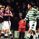 Neil McCann (left) celebrates his goal with Hearts teammate John Robertson in a 2-2 draw with Celtic in November 1996