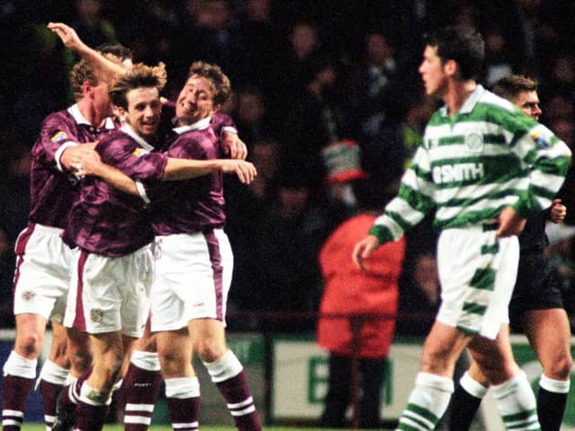 Neil McCann (left) celebrates his goal with Hearts teammate John Robertson in a 2-2 draw with Celtic in November 1996