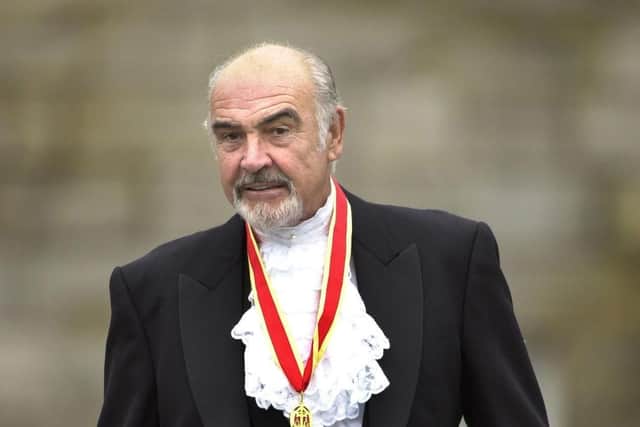 Sir Sean Connery after being knighted by the Queen at the Palace of Holyroodhouse in Edinburgh in 2000. Picture: David Cheskin/PA.