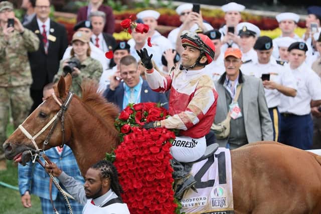 Jockey Sonny Leon aboard Rich Strike celebrates after Rich Strike won the 148th running at Churchill Downs on May 07, 2022 in Louisville, Kentucky.