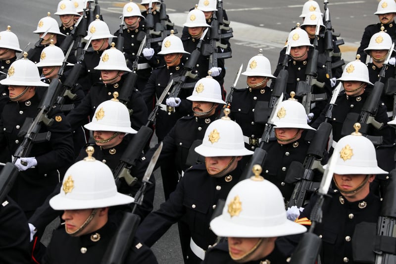 Troops parade in London, ahead of the coronation of King Charles III and Queen Camilla on Saturday.