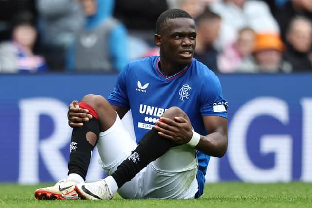 Rabbi Matondo goes down injured during Rangers' 1-0 win over Motherwell at Ibrox. (Photo by Ross MacDonald / SNS Group)
