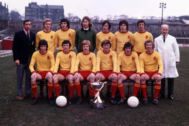 The The Partick Thistle team with the League Cup trophy in 1971.