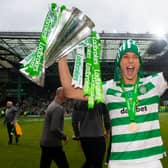 Filip Benkovic with the Scottish Cup trophy after helping Celtic complete the treble-treble. Picture: SNS