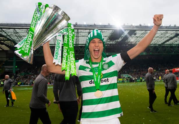 Filip Benkovic with the Scottish Cup trophy after helping Celtic complete the treble-treble. Picture: SNS