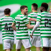 GLASGOW, SCOTLAND - FEBRUARY 27:  Celtic’s Odsonne Edouard celebrates with Ryan Christie after scoring to make it 1-0during the Scottish Premiership match between Celtic and Aberdeen at Celtic Park on February 27, 2021, in Glasgow, Scotland. (Photo by Rob Casey / SNS Group)