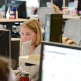 Women outperform men in education, but that's not reflected in the make-up of senior management in office settings (Picture: Robyn Beck/AFP via Getty Images)