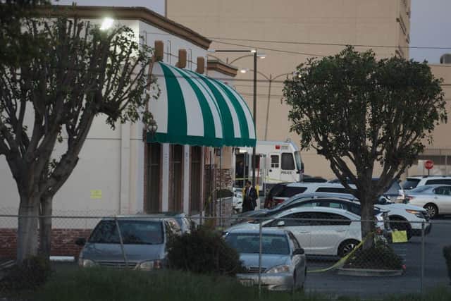 Members of law enforcement investigate the scene of the deadly shooting in Monterey Park, California.