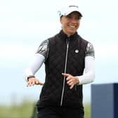 Sophia Popov walks forward to collect her trophy following her two-shot victory in the AIG Women’s Open. Picture: R&A via Getty.