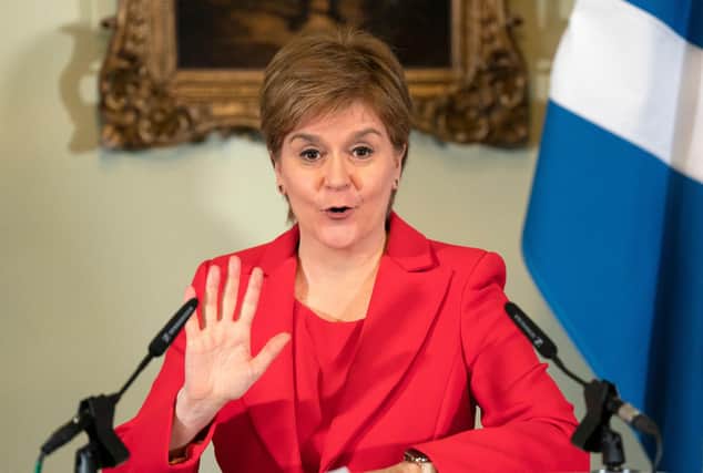 Nicola Sturgeon at yesterday's Bute House press conference where she announced she will stand down as First Minister (Picture: Jane Barlow/Pool/AFP)